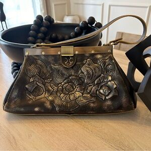 Patricia Nash metallic gold flower detail handbag